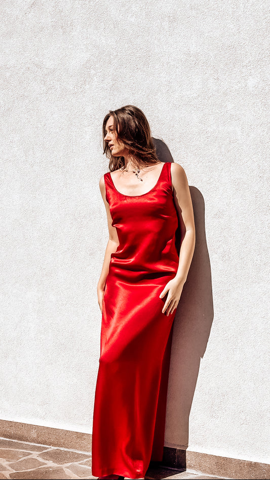 Long dress in viscose satin with side slit and open back